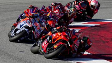 Ducati Italian rider Francesco Bagnaia (R) followed by Ducati Spanish rider Marc Marquez and Ducati Spanish rider Jorge Martin (L) compete during the MotoGP Solidarity Grand Prix of Barcelona at the Circuit de Catalunya on November 17, 2024 in Montmelo on the outskirts of Barcelona. (Photo by Manaure Quintero / AFP)