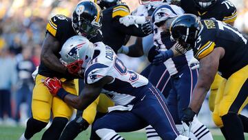 PITTSBURGH, PA - OCTOBER 23: Le'Veon Bell #26 of the Pittsburgh Steelers is stopped by Jamie Collins #91 of the New England Patriots in the first quarter during the game at Heinz Field on October 23, 2016 in Pittsburgh, Pennsylvania. Justin K. Aller/Getty Images/AFP
== FOR NEWSPAPERS, INTERNET, TELCOS & TELEVISION USE ONLY ==
