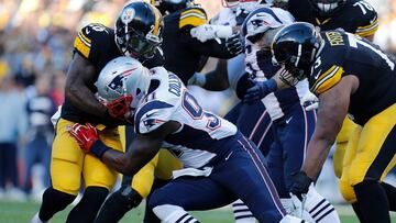 PITTSBURGH, PA - OCTOBER 23: Le&#039;Veon Bell #26 of the Pittsburgh Steelers is stopped by Jamie Collins #91 of the New England Patriots in the first quarter during the game at Heinz Field on October 23, 2016 in Pittsburgh, Pennsylvania.   Justin K. Aller/Getty Images/AFP
 == FOR NEWSPAPERS, INTERNET, TELCOS &amp; TELEVISION USE ONLY ==