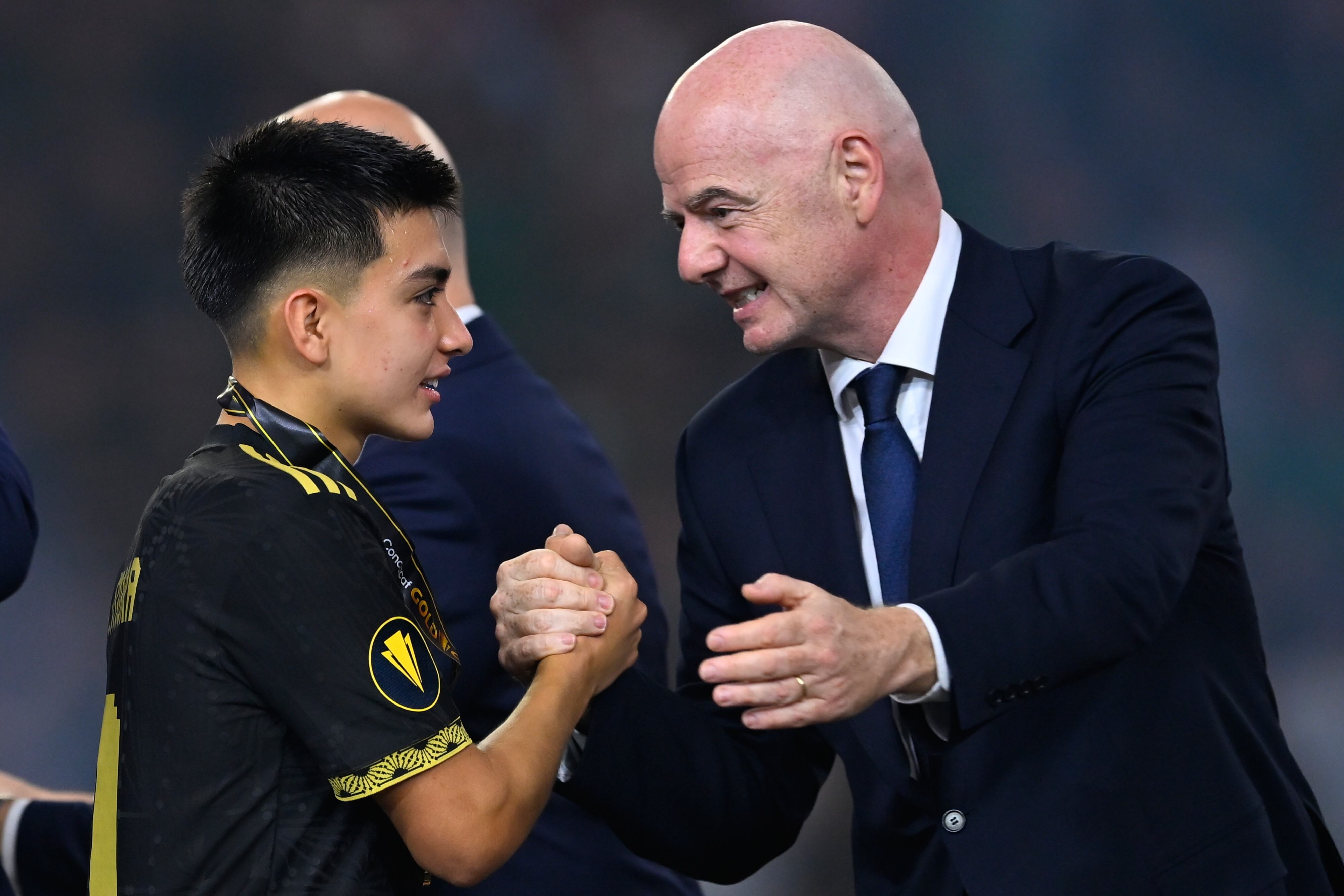 Gilberto Mora of Mexico and Gianni Infantino President of FIFA  during the Final match between United States USA) and Mexico (Mexican National Team) as part of the 2025 CONCACAF Gold Cup at NRG Stadium, on July 06, 2025 in Houston, Texas, United States.