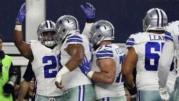 Dec 26, 2016; Arlington, TX, USA; Dallas Cowboys running back Ezekiel Elliott (21) celebrates with teammates after scoring a touchdown during the second half against the Detroit Lions at AT&T Stadium. Mandatory Credit: Kevin Jairaj-USA TODAY Sports