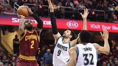 Feb 1, 2017; Cleveland, OH, USA; Cleveland Cavaliers guard Kyrie Irving (2) shoots over the defense of Minnesota Timberwolves guard Ricky Rubio (9) during the second half at Quicken Loans Arena. The Cavs won 125-97. Mandatory Credit: Ken Blaze-USA TODAY Sports