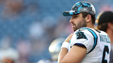 Baker Mayfield of the Carolina Panthers looks on bef the preseason game between the New England Patriots and the Carolina Panthers at Gillette Stadium on August 19, 2022 in Foxborough, Massachusetts.