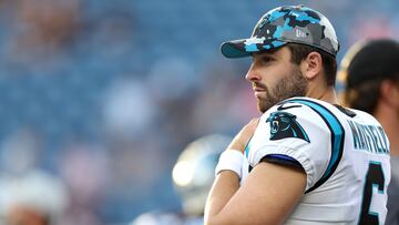 Baker Mayfield of the Carolina Panthers looks on bef the preseason game between the New England Patriots and the Carolina Panthers at Gillette Stadium on August 19, 2022 in Foxborough, Massachusetts.