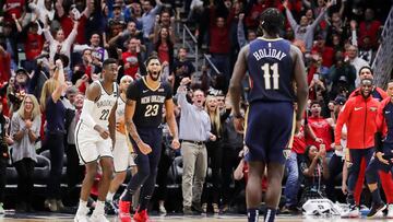 Oct 26, 2018; New Orleans, LA, USA; New Orleans Pelicans forward Anthony Davis (23) reacts to guard Jrue Holiday (11) getting the lead in the game against Brooklyn Nets with 2.0 seconds left in the game at Smoothie King Center. Mandatory Credit: Stephen Lew-USA TODAY Sports