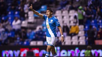 Guillermo Mart&iacute;nez durante un partido con Puebla