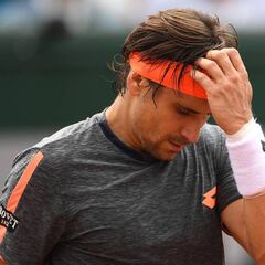 Ferrer labels French Open "a scam" as rain row thunders on
