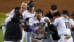 PHOENIX, ARIZONA - OCTOBER 19: Ketel Marte #4 of the Arizona Diamondbacks celebrates with his teammates after hitting an RBI single against Craig Kimbrel #31 of the Philadelphia Phillies to win Game Three of the National League Championship Series at Chase Field on October 19, 2023 in Phoenix, Arizona.   Norm Hall/Getty Images/AFP (Photo by Norm Hall / GETTY IMAGES NORTH AMERICA / Getty Images via AFP)