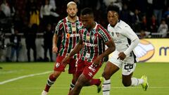 Fluminense's Colombian forward Jhon Arias (L) and Liga de Quito's midfielder Jhojan Julio fight for the ball during the Conmebol Recopa Sudamericana first leg final match between Ecuador's Liga de Quito and Brazil's Fluminense at the Rodrigo Paz Delgado stadium in Quito, on February 22, 2024. (Photo by Galo Paguay / AFP)