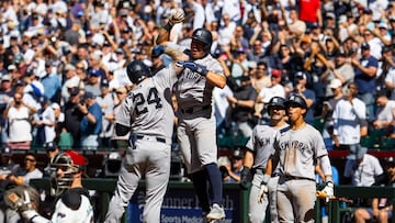 Apr 3, 2024; Phoenix, Arizona, USA; New York Yankees outfielder Alex Verdugo (24) celebrates with teammate Anthony Volpe after hitting a two run home run in the tenth inning against the Arizona Diamondbacks at Chase Field. Mandatory Credit: Mark J. Rebilas-USA TODAY Sports