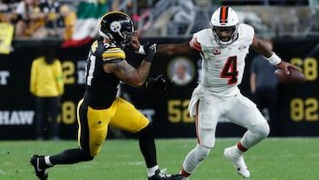 Sep 18, 2023; Pittsburgh, Pennsylvania, USA; Cleveland Browns quarterback Deshaun Watson (4) is flagged for a face masking penalty as he attempts to elude Pittsburgh Steelers linebacker Nick Herbig (51) during the fourth quarter at Acrisure Stadium. Pittsburgh won 26-22. Mandatory Credit: Charles LeClaire-USA TODAY Sports