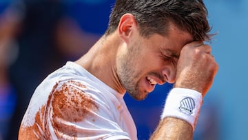 Argentina's Pedro Cachin reacts after winning his final match against Spain's Albert Ramos-Vinolas at the Swiss Open tennis tournament in Gstaad, southwestern Switzerland, on July 23, 2023. (Photo by Fabrice COFFRINI / AFP)