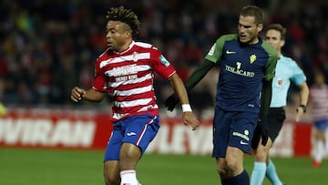 Kunde, junto a Barba, durante un Granada-Sporting.