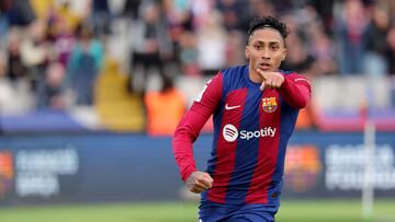 Barcelona's Brazilian forward #11 Raphinha celebrates scoring his team's first goal during the Spanish league football match between FC Barcelona and Getafe CF at the Estadi Olimpic Lluis Companys in Barcelona on February 24, 2024. (Photo by LLUIS GENE / AFP)