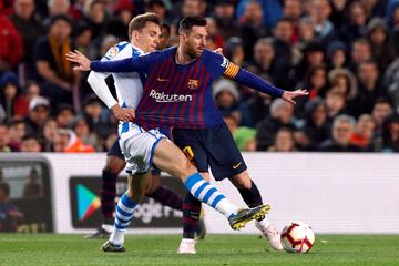 Messi y Diego Llorente.