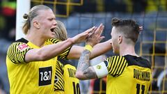 Dortmund&#039;s Norwegian forward Erling Braut Haaland (L) celebrates for scoring the 5-0 goal with Dortmund&#039;s German forward Marco Reus (R) during the German first division Bundesliga football match Borussia Dortmund v VfL Wolfsburg in Dortmund, wes