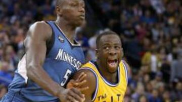 Draymond Green ante Gorgui Dieng.