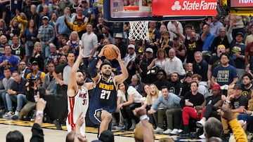 Jun 4, 2023; Denver, CO, USA; Denver Nuggets guard Jamal Murray (27) shoots the ball against Miami Heat guard Max Strus (31) during the first half in game two of the 2023 NBA Finals at Ball Arena. Mandatory Credit: Kyle Terada-USA TODAY Sports