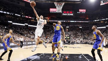 May 20, 2017; San Antonio, TX, USA; San Antonio Spurs shooting guard Manu Ginobili (20) drives to the basket past Golden State Warriors power forward David West (3) during the first half in game three of the Western conference finals of the NBA Playoffs at AT&amp;T Center. Mandatory Credit: Soobum Im-USA TODAY Sports