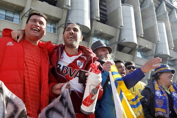 Boca Juniors and River Plate fans outside the Santiago Bernabéu earlier today