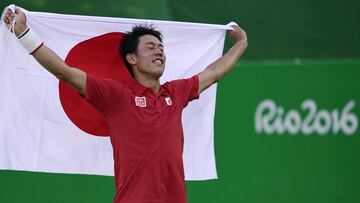 Kei Nishikori celebrates after beating Rafael Nadal in Rio de Janeiro.