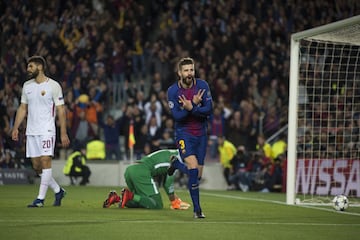 Piqué celebrates after scoring.