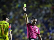 Referee Cesar Arturo Ramos shows yellow card to Israel Reyes of America during the quarter-final second match between America and Monterrey as part of the Liga BBVA MX, Torneo Apertura 2025 at Ciudad de los Deportes Stadium, on November 29, 2025 in Mexico City, Mexico.