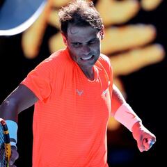 Nadal through in Melbourne but back issues persist for No. 2