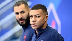 France&#039;s forward Karim Benzema (L) and France&#039;s forward Kylian Mbappe arrive for a training session at the Stade de France in Saint-Denis, north of Paris on June 7, 2021, on the eve of the friendly football match between France and Bulgaria. (Ph