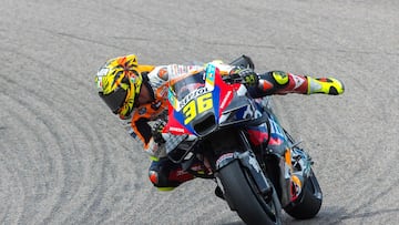 Repsol Honda Team's Spanish rider Joan Mir (R) races ahead of Repsol Honda Team's German rider Stefan Bradl during the sprint race of the German Motorcycle Grand Prix at the Sachsenring racetrack in Hohenstein-Ernstthal, eastern Germany, on July 6, 2024. (Photo by Radek Mica / AFP)