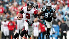 CHARLOTTE, NC - DECEMBER 24: Matt Ryan #2 of the Atlanta Falcons runs the ball against the Carolina Panthers in the 3rd quarter during their game at Bank of America Stadium on December 24, 2016 in Charlotte, North Carolina.   Streeter Lecka/Getty Images/AFP
 == FOR NEWSPAPERS, INTERNET, TELCOS &amp; TELEVISION USE ONLY ==