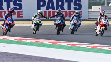 Winner Sterilgarda Max Racing Team&#039;s Italian rider Romano Fenati (2nd L) gestures to second placed SKY Racing Team VR46&#039;s Italian rider Celestino Vietti (3rd R) after the Moto3 race of the Emilia Romagna Grand Prix at the Misano World Circuit Ma