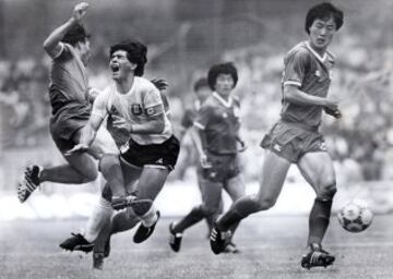 Maradona in action against South Korea at the 1986 World Cup.