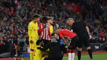 SOUTHAMPTON, ENGLAND - MAY 17: Joe Gomez of Liverpool receives medical treatment during the Premier League match between Southampton and Liverpool at St Mary's Stadium on May 17, 2022 in Southampton, England. (Photo by Mike Hewitt/Getty Images)