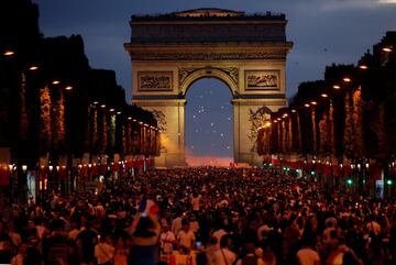 French fans take to the streets to celebrate World Cup final place