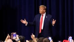 FILE PHOTO: Republican presidential candidate and former U.S. President Donald Trump gestures as he hosts a campaign rally at the Forum River Center in Rome, Georgia, U.S. March 9, 2024. REUTERS/Alyssa Pointer/File Photo