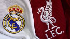 This picture taken on May 22, 2018 in Paris, shows the logos on jerseys of Real Madrid and Liverpool FC.
 Real Madrid CF and Liverpool FC will play the UEFA Champions League final football match in Kiev on May 26, 2018. / AFP PHOTO / FRANCK FIFE