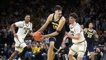 Aday Mara #15 of the Michigan Wolverines drives down the court in the second half against Isaia Howard #23 of the Iowa Hawkeyes at Carver-Hawkeye Arena on March 5, 2026 in Iowa City, Iowa.