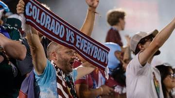 Aug 3, 2025; Commerce City, CO, USA; Colorado Rapids fans celebrate after a goal in the second half against Club Tijuana at DICK'S Sporting Goods Park. Mandatory Credit: Isaiah J. Downing-Imagn Images