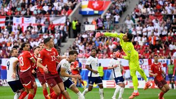 Switzerland's goalkeeper #01 Yann Sommer (R) punches the ball out in front of (From L) England's forward #09 Harry Kane, Switzerland's defender #13 Ricardo Rodriguez, Switzerland's defender #22 Fabian Schaer and England's defender #05 John Stones during the UEFA Euro 2024 quarter-final football match between England and Switzerland at the Duesseldorf Arena in Duesseldorf on July 6, 2024. (Photo by INA FASSBENDER / AFP)