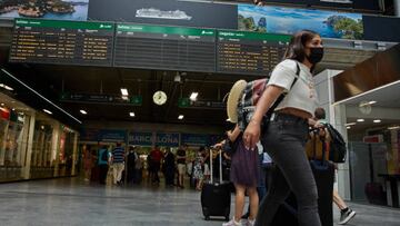 MADRID, SPAIN - JULY 01: Travelers with their suitcases at Atocha-Estacion de Madrid-Chamartin-Clara Campoamor station, July 1, 2022, in Madrid, Spain. As every year, the start of the summer months means an increase in travel at train stations. This 2022 is marked by being the first in two years in which travelers will be able to enjoy their destinations almost 100% without restrictions due to the coronavirus. (Photo By Jesus Hellin/Europa Press via Getty Images)