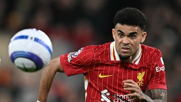 Liverpool's Colombian midfielder #07 Luis Diaz chases down the ball during the English Premier League football match between Liverpool and Everton at Anfield in Liverpool, north west England on April 2, 2025. (Photo by Paul ELLIS / AFP) / RESTRICTED TO EDITORIAL USE. No use with unauthorized audio, video, data, fixture lists, club/league logos or 'live' services. Online in-match use limited to 120 images. An additional 40 images may be used in extra time. No video emulation. Social media in-match use limited to 120 images. An additional 40 images may be used in extra time. No use in betting publications, games or single club/league/player publications. /