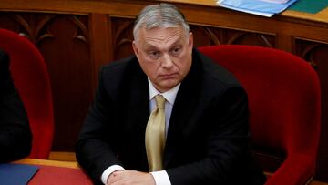 FILE PHOTO: Hungarian Prime Minister Viktor Orban sits before taking the oath of office in the Parliament in Budapest, Hungary, May 16, 2022. REUTERS/Bernadett Szabo/File Photo
