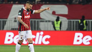Nice's Algerian forward Andy Delort celebrates after scoring a goal during the French Cup quarter-final football match between OGC Nice and Olympique de Marseille at the "Allianz Riviera" stadium in Nice, southern France on February 9, 2022. (Photo by Valery HACHE / AFP)