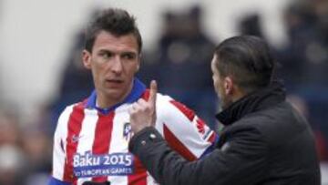 Simeone y Mandzukic, durante el último Atlético-Real Madrid.