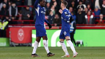 Chelsea's French defender #02 Axel Disasi celebrates with Chelsea's English midfielder #20 Cole Palmer after scoring his team's equaliser during the English Premier League football match between Brentford and Chelsea at the Gtech Community Stadium in London on March 2, 2024. (Photo by Darren Staples / AFP) / RESTRICTED TO EDITORIAL USE. No use with unauthorized audio, video, data, fixture lists, club/league logos or 'live' services. Online in-match use limited to 120 images. An additional 40 images may be used in extra time. No video emulation. Social media in-match use limited to 120 images. An additional 40 images may be used in extra time. No use in betting publications, games or single club/league/player publications. / 