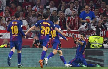 Luis Suárez celebrates after scoring his second goal.