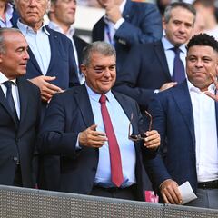 A black-eyed Laporta appears in the Barcelona directors box