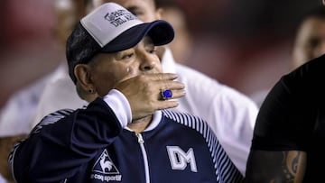 BUENOS AIRES, ARGENTINA - FEBRUARY 22: Diego Maradona coach of Gimnasia y Esgrima La Plata waves the fans before second half during a match between Independiente and Gimnasia y Esgrima La Plata as part of Superliga 2019/20 at Estadio Libertadores de America on February 22, 2020 in Buenos Aires, Argentina. (Photo by Marcelo Endelli/Getty Images)