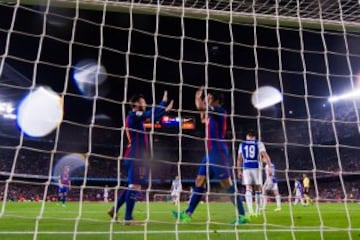 BARCELONA, SPAIN - APRIL 15: Lionel Messi (L) of FC Barcelona celebrates with his teammate Luis Suarez after scoring his team's second goal during the La Liga match between FC Barcelona and Real Sociedad de Futbol at Camp Nou stadium on April 15, 2017 in 